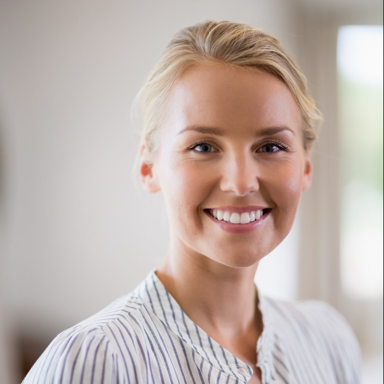 beautiful woman smiling at home e1612948957449 construction service,econstruct,econstruct consultancy