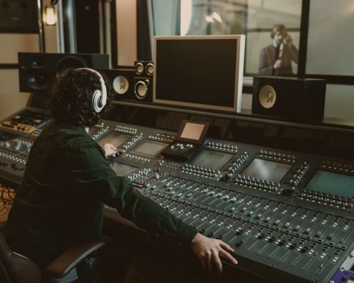 sound-producer-working-at-studio-while-recording-song.jpg